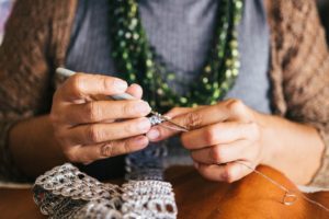 A woman crocheting