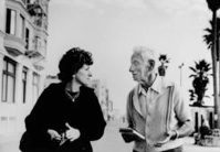 Two people chatting on a city walk